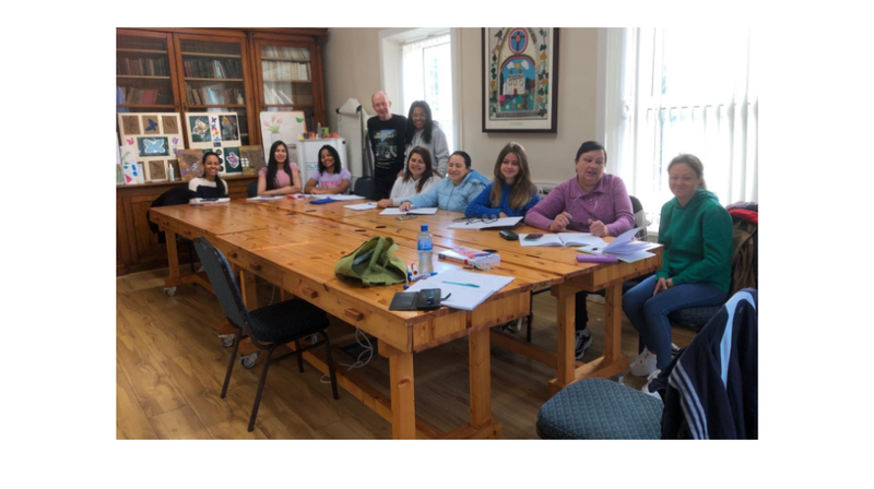 Parents attending a workshop.